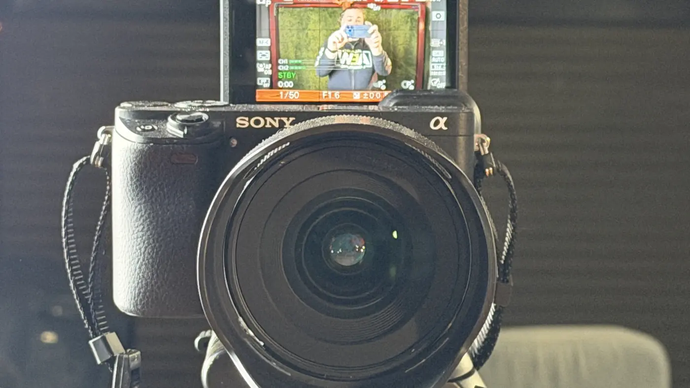Mirrorless camera on a tripod in the workshop