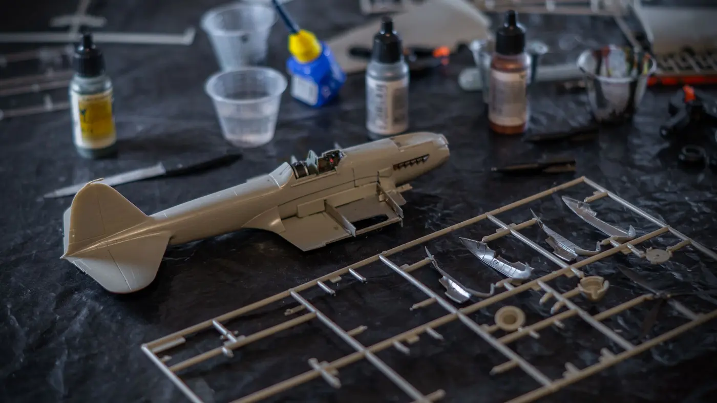 Brushes and paints at the hobby table